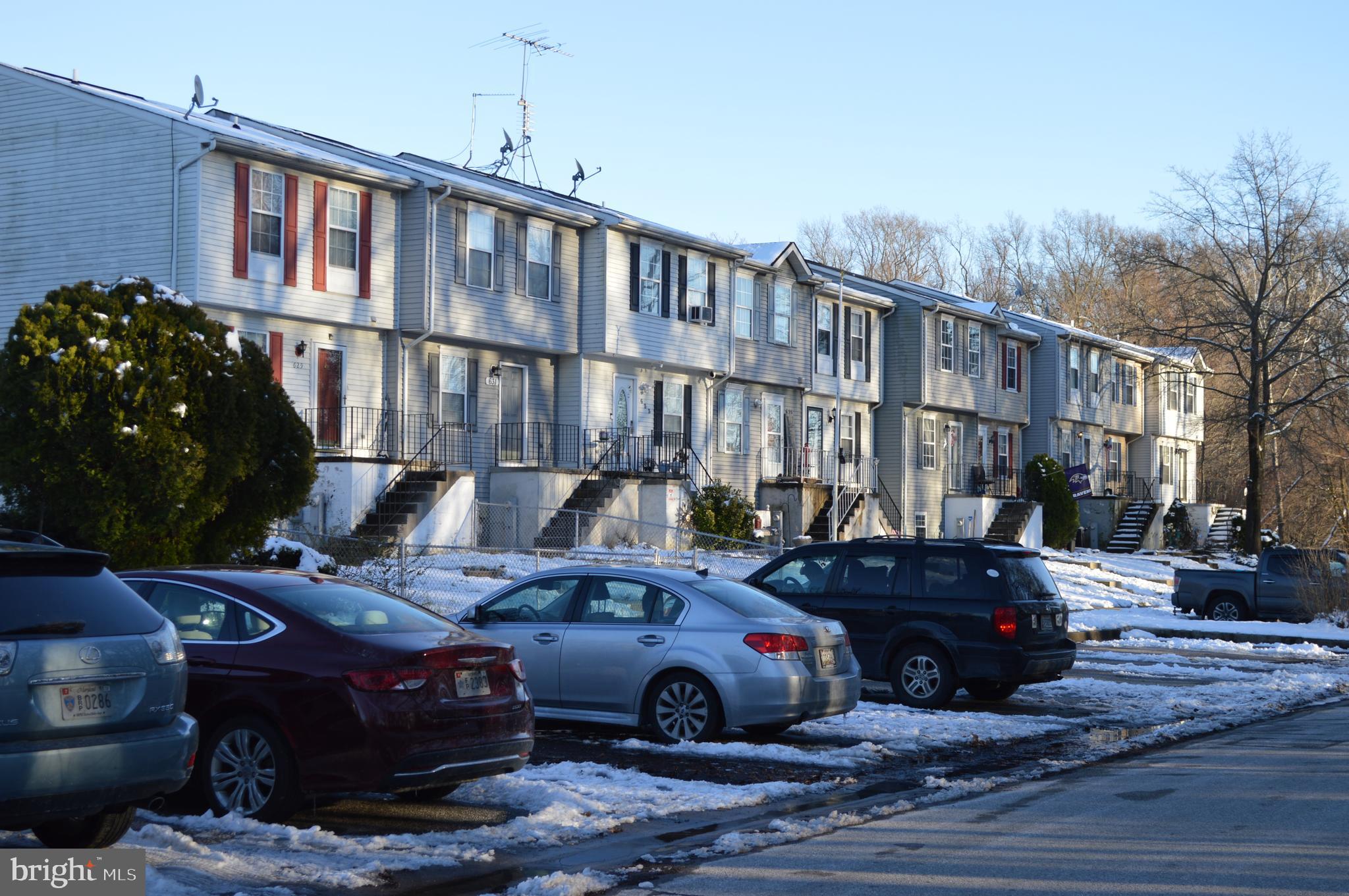 615 Nollmeyer Road Baltimore, MD 21220 - Photo 2 of 46 a couple of cars parked in front of a house