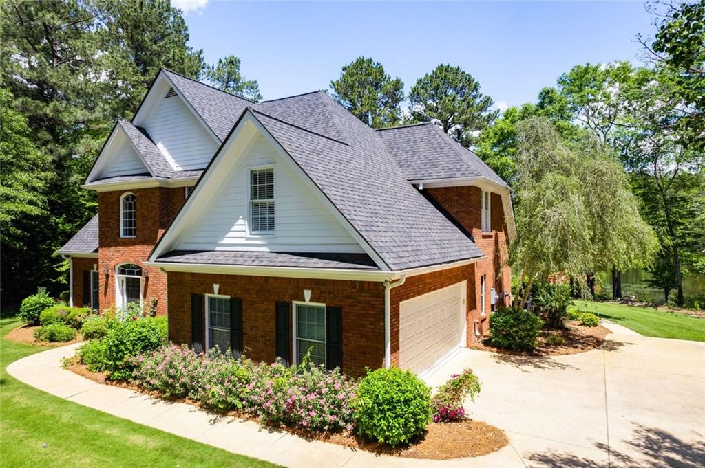 110 Pond View Point LaGrange, GA 30240 - Photo 3 of 68 front view of a house with a yard