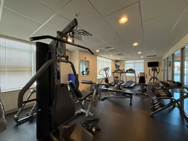 a view of a room with gym equipment