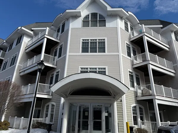 a front view of a house with a door