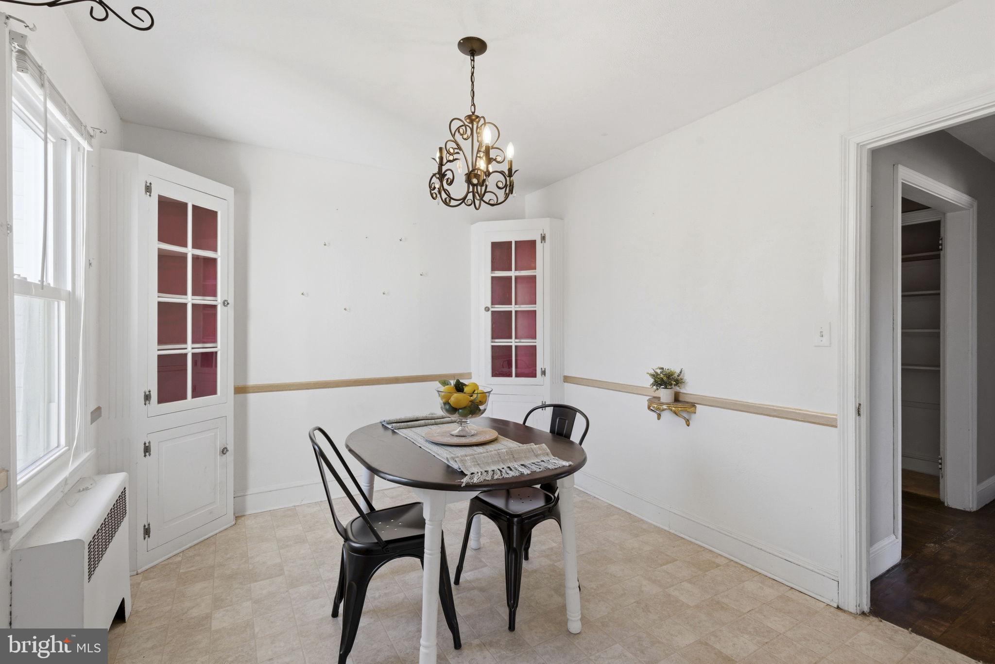 213 Groff Road Millington, MD 21651 - Photo 13 of 48 a view of a dining room with furniture and wooden floor