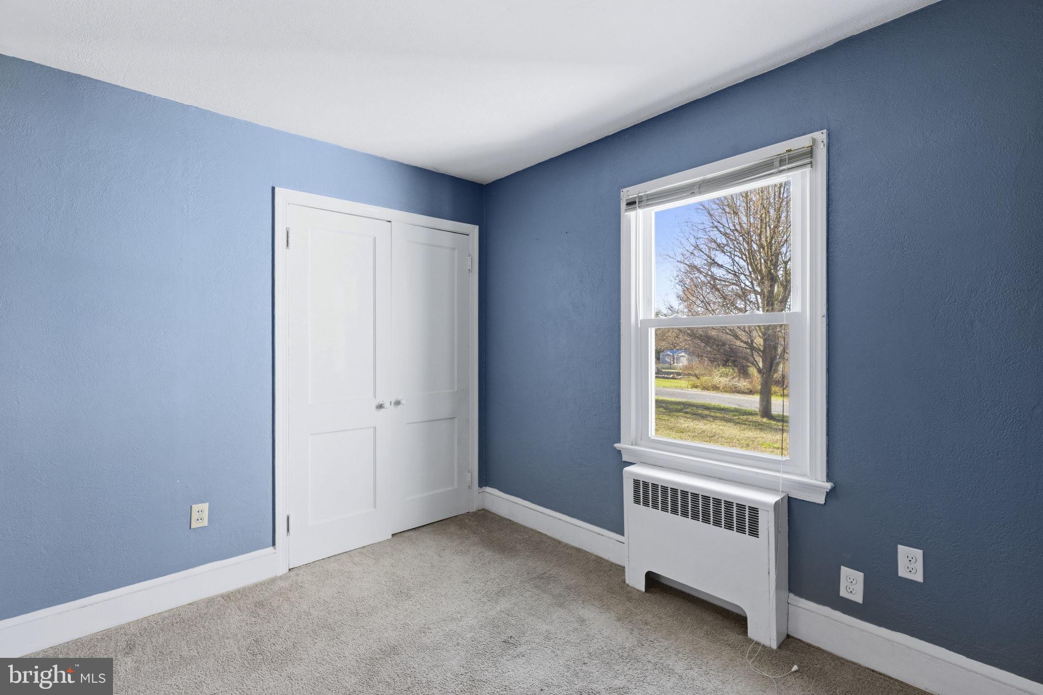 213 Groff Road Millington, MD 21651 - Photo 21 of 48 an empty room with windows and closet