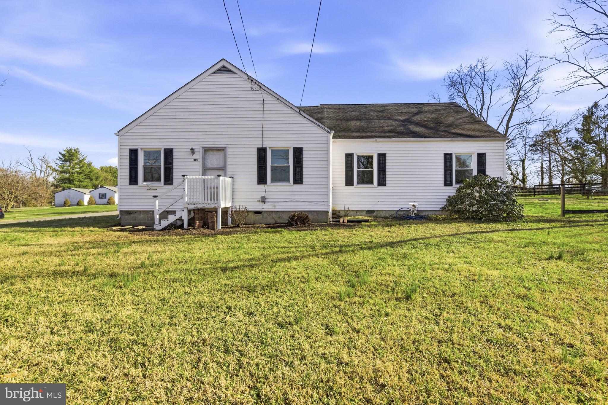 213 Groff Road Millington, MD 21651 - Photo 38 of 48 a front view of a house with garden