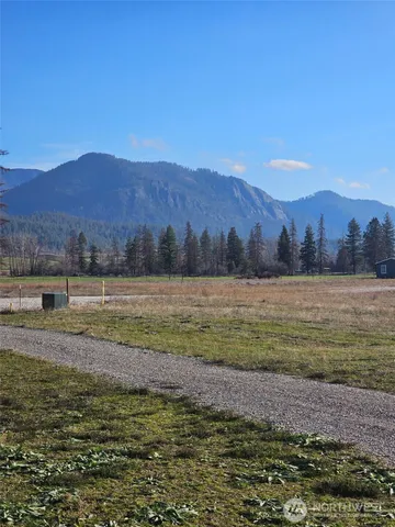 a view of a lake with mountains in the background