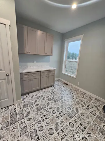 a view of a storage and utility room