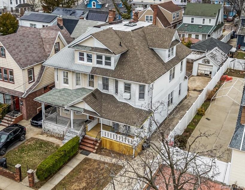 196-19 89th Road Queens, NY 11423 - Photo 23 of 28 an aerial view of residential houses with yard