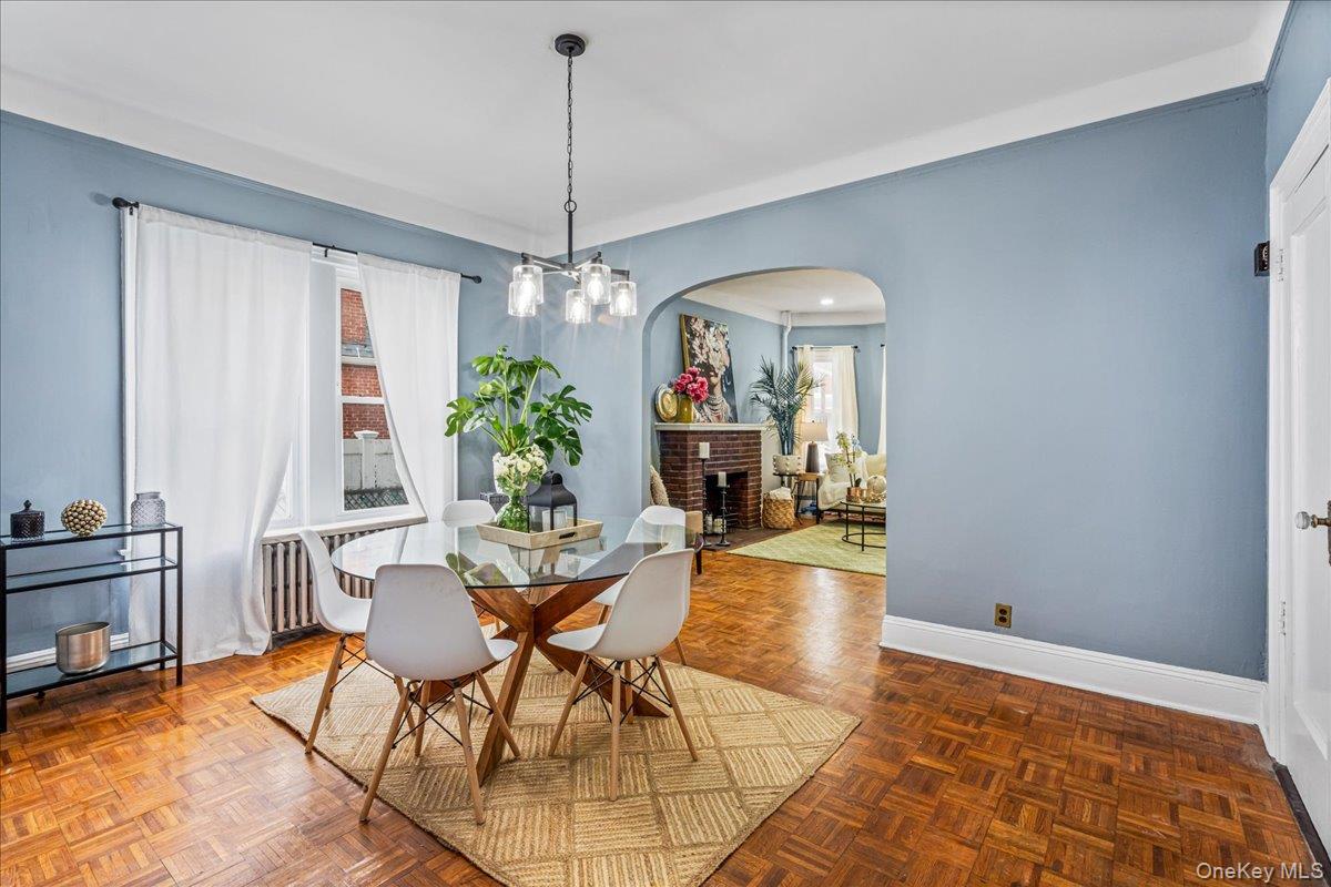 196-19 89th Road Queens, NY 11423 - Photo 6 of 28 a view of a dining room with furniture window and wooden floor