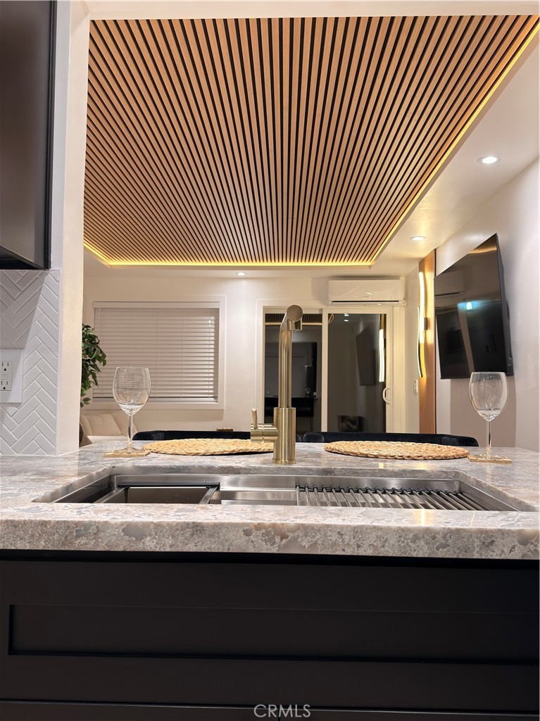 1140 Pacific Avenue, Unit 7 Long Beach, CA 90813 - Photo 10 of 21 a view of living room with granite countertop furniture