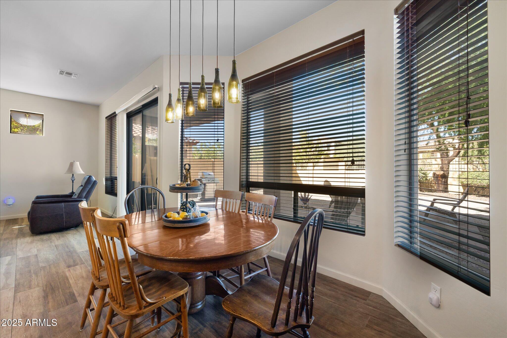 8536 East Inca Street Mesa, AZ 85207 - Photo 4 of 44 a dining room with furniture and window