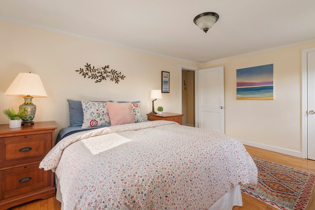 75 Fremont Street Arlington, MA 02474 - Photo 12 of 20 a bedroom with a bed and a window