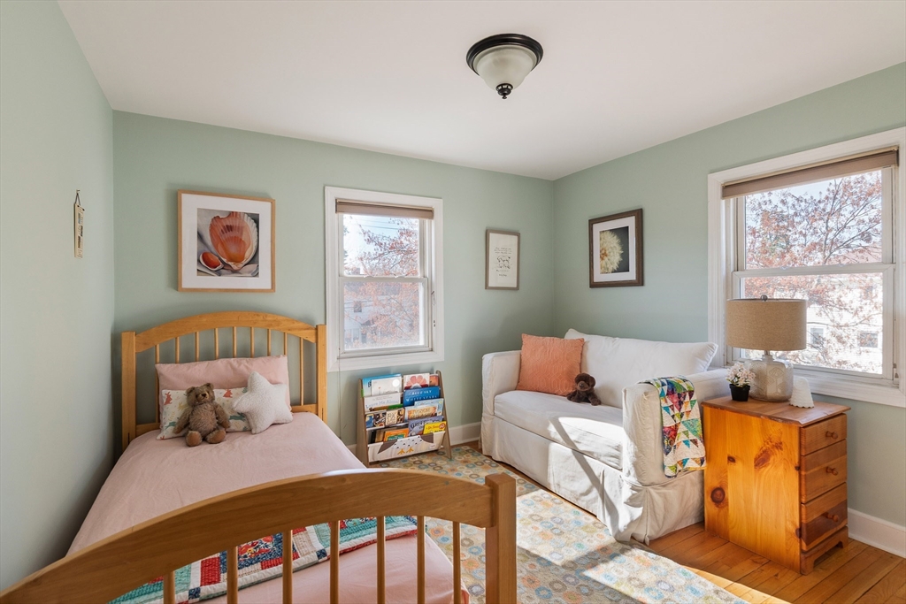 75 Fremont Street Arlington, MA 02474 - Photo 14 of 20 a bed room with furniture and a window