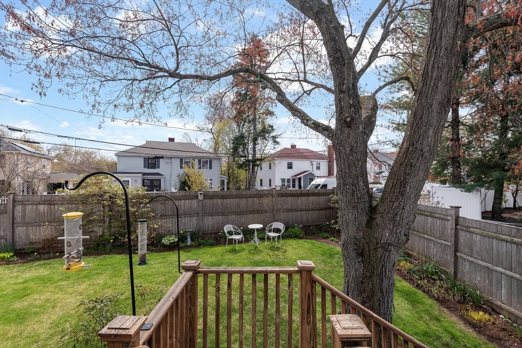 75 Fremont Street Arlington, MA 02474 - Photo 18 of 20 a front view of a house with garden