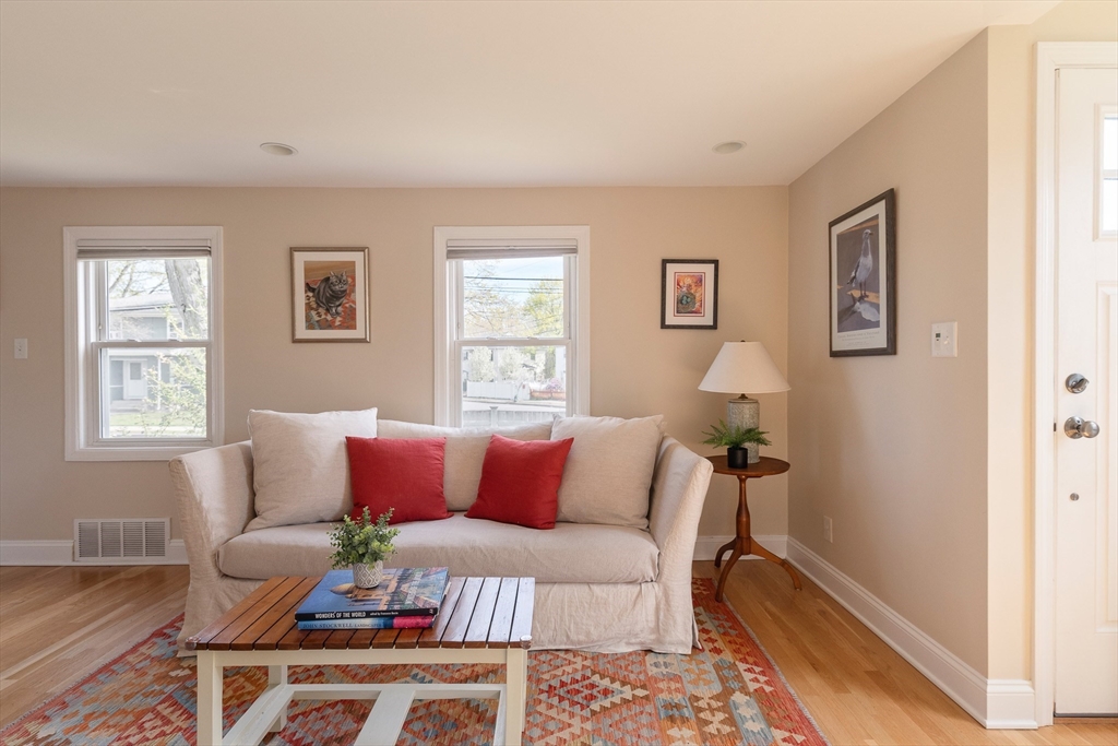 75 Fremont Street Arlington, MA 02474 - Photo 3 of 20 a living room with furniture and a window