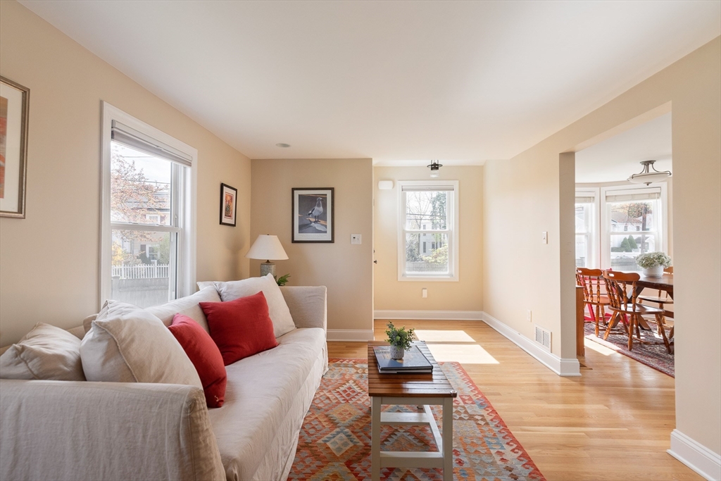 75 Fremont Street Arlington, MA 02474 - Photo 5 of 20 a living room with furniture and wooden floor
