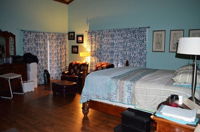 429 Hudson Jones Road Cochran, GA 31014 - Photo 15 of 45 a bedroom with a bed and wooden floor