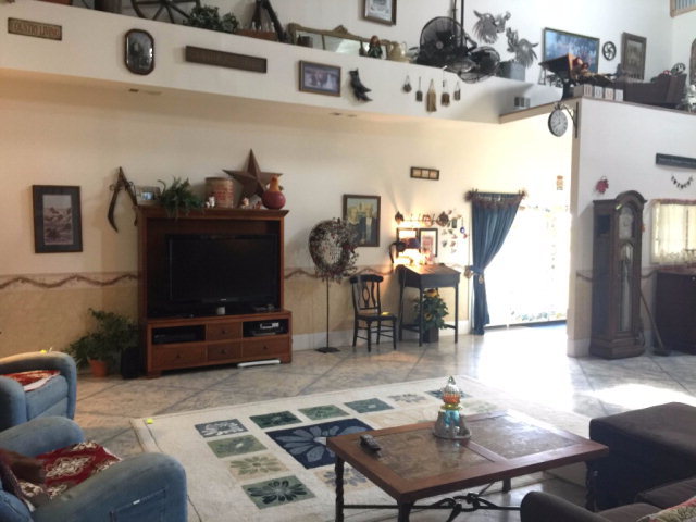 429 Hudson Jones Road Cochran, GA 31014 - Photo 7 of 45 a living room with furniture and a flat screen tv