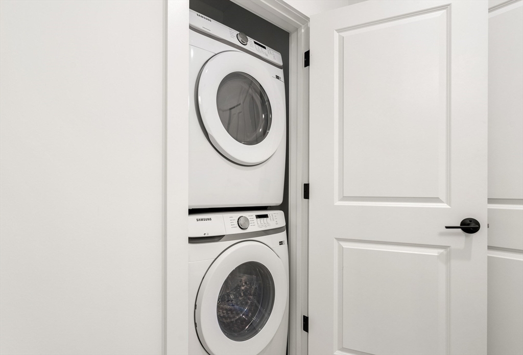 600 Broadway, Unit 316 Chelsea, MA 02150 - Photo 7 of 25 a utility room with dryer and washer