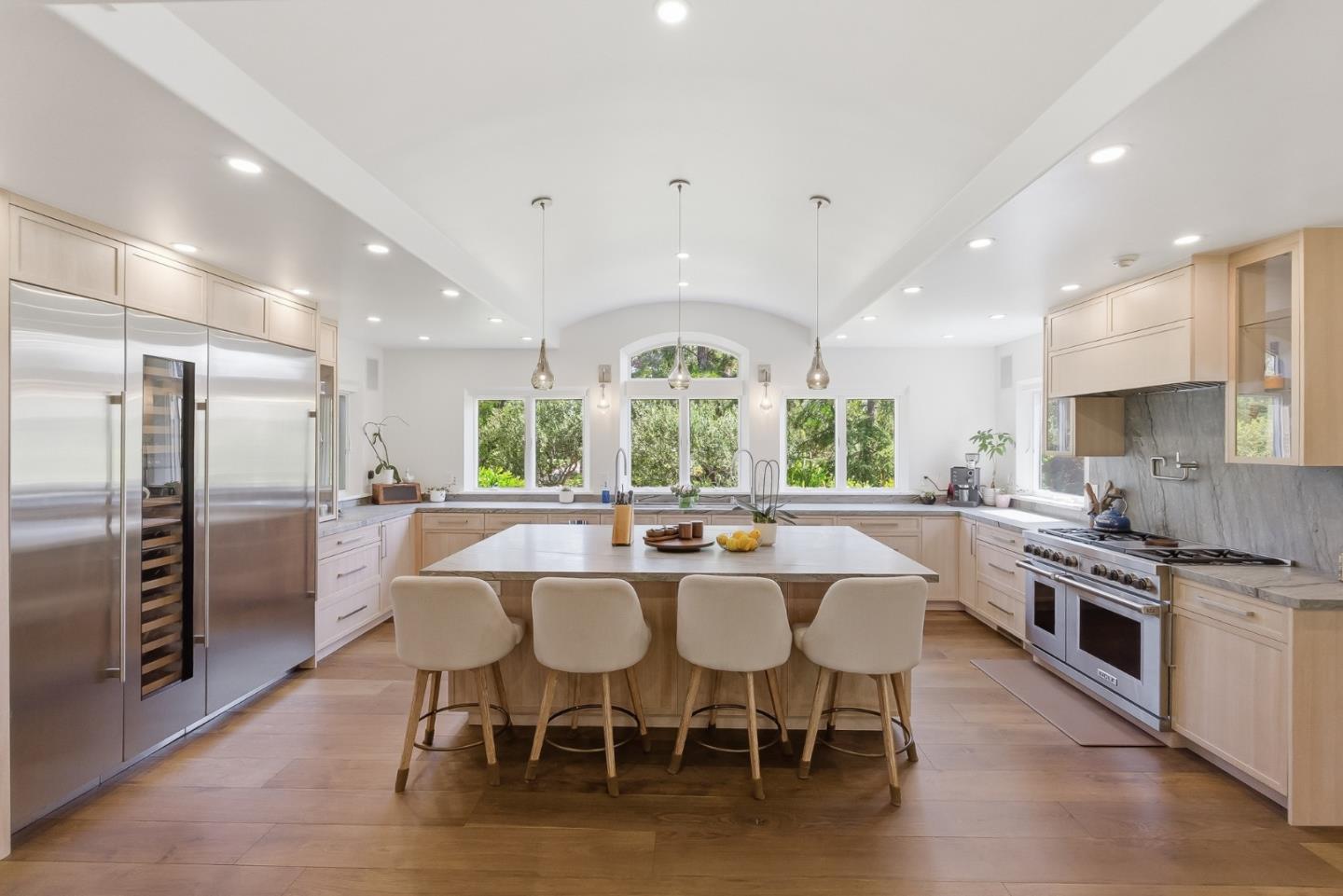 285 Ridgeway Road Woodside, CA 94062 - Photo 2 of 28 a large kitchen with a table and chairs