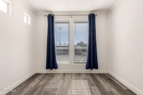 an empty room with windows