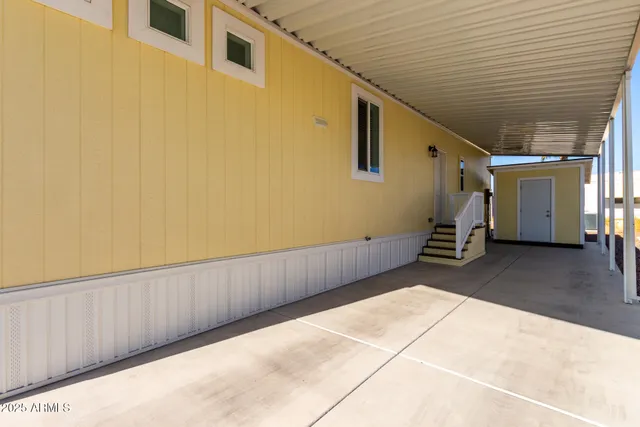 a view of a big room with wooden walls