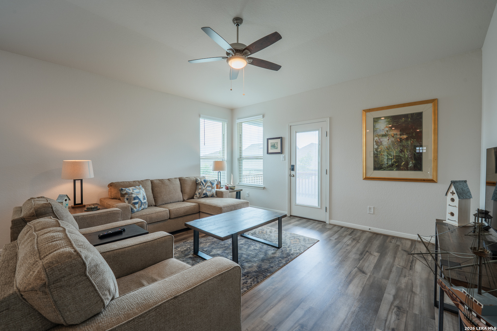 4947 Ranahan Pass St. Hedwig, TX 78152 - Photo 14 of 37 a living room with furniture and a ceiling fan