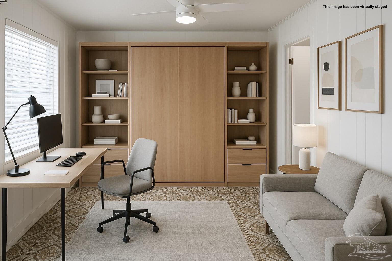 8246 Chellie Road Pensacola, FL 32526 - Photo 13 of 20 a view of a livingroom with workspace and a couch