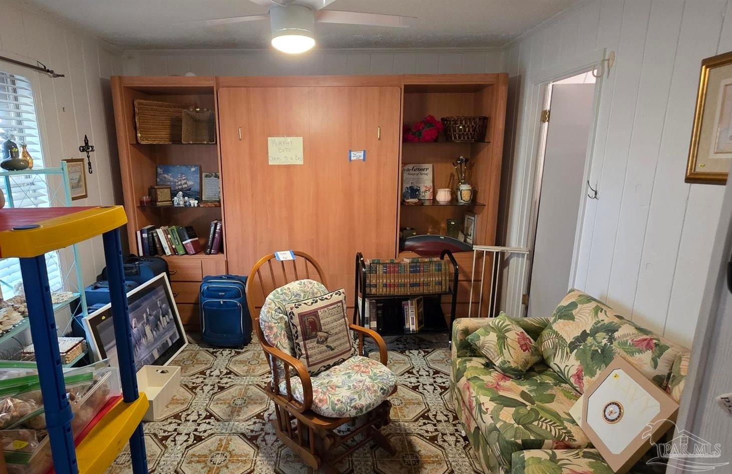 8246 Chellie Road Pensacola, FL 32526 - Photo 14 of 20 a living room with furniture