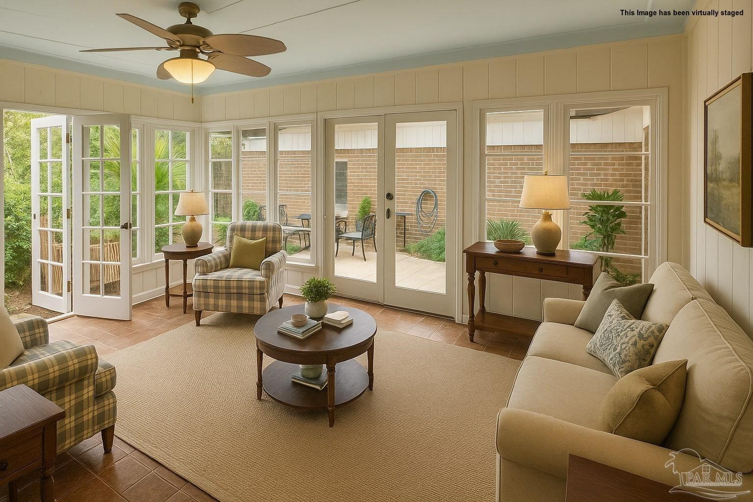 8246 Chellie Road Pensacola, FL 32526 - Photo 15 of 20 a living room with furniture and a large window with outer view