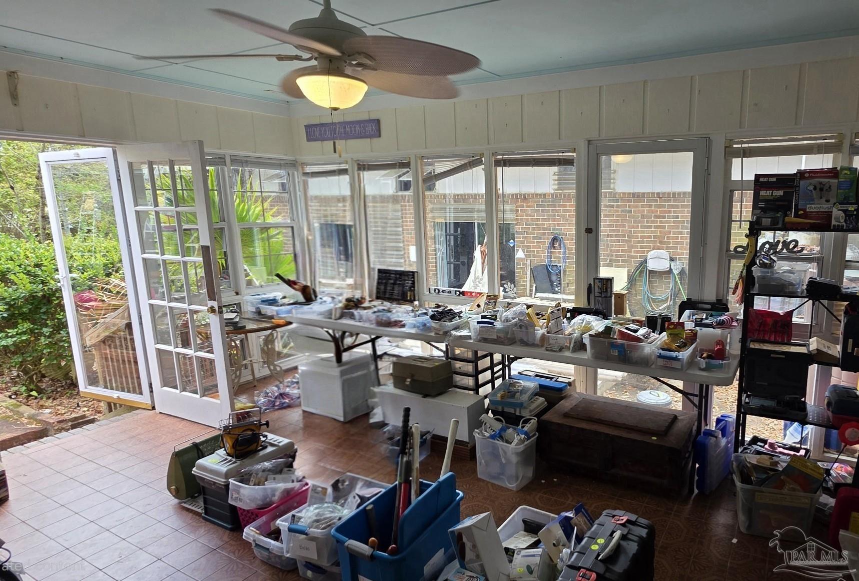 8246 Chellie Road Pensacola, FL 32526 - Photo 16 of 20 a very nice looking living room with furniture and a large window