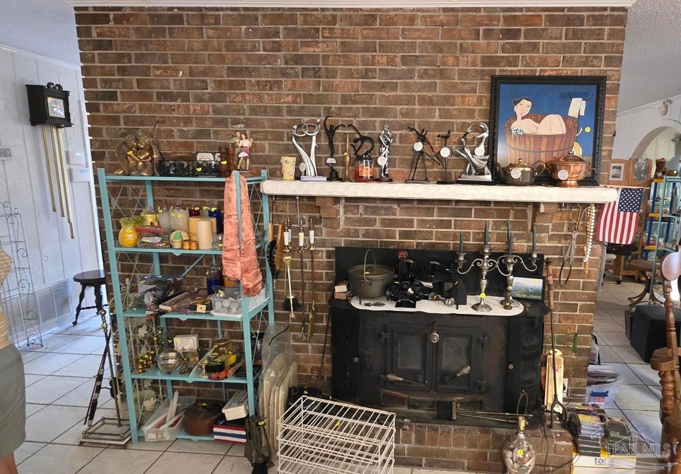 8246 Chellie Road Pensacola, FL 32526 - Photo 10 of 20 a room with fireplace