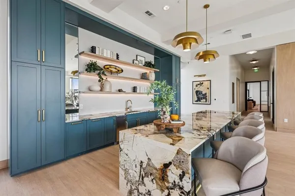 a very nice looking dining room with a table and chairs