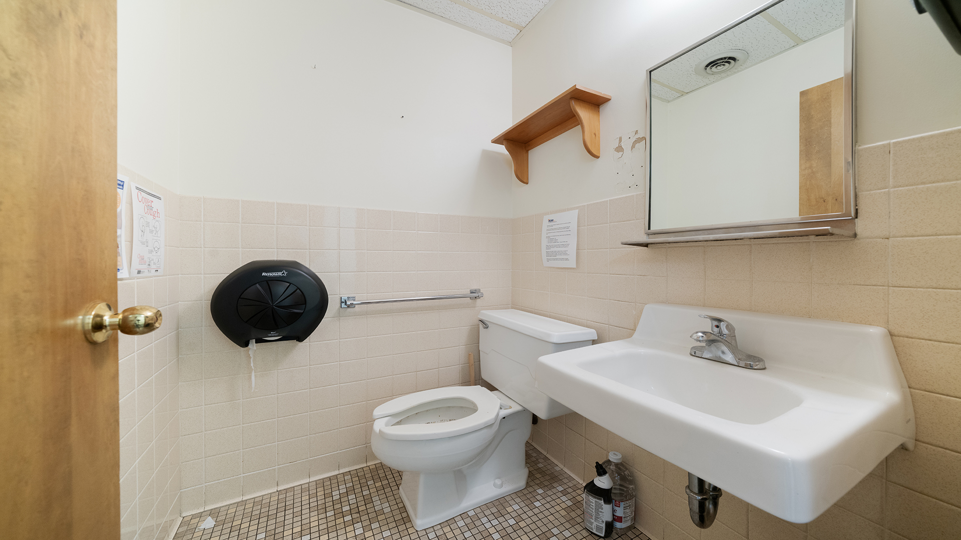 405 Charles Street Mount Morris, IL 61054 - Photo 32 of 61 a bathroom with a toilet sink and mirror