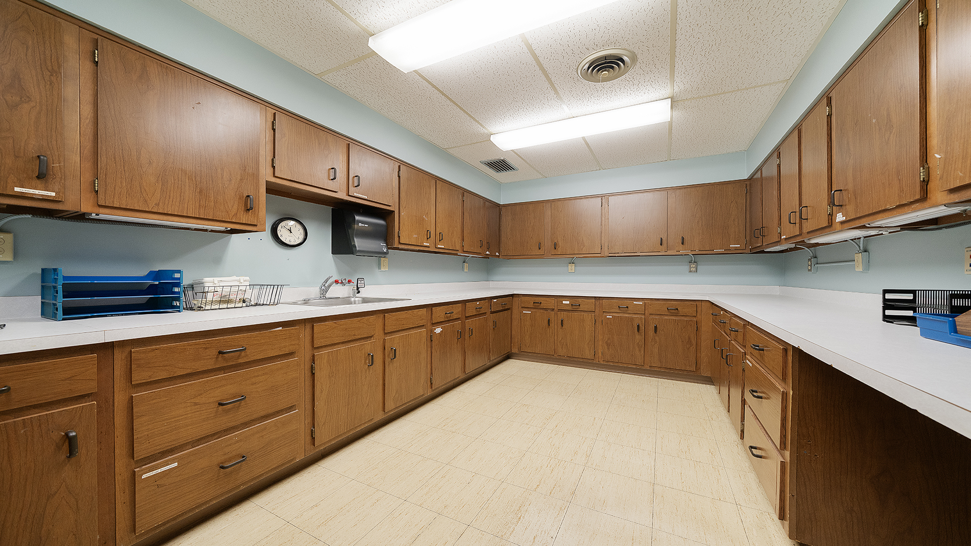 405 Charles Street Mount Morris, IL 61054 - Photo 42 of 61 a kitchen with granite countertop a sink cabinets and stainless steel appliances