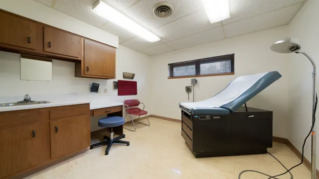 a view of an empty room with empty shelves