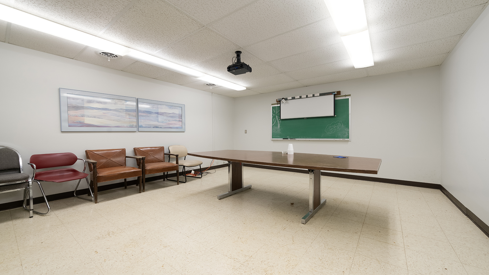 405 Charles Street Mount Morris, IL 61054 - Photo 48 of 61 a living room with furniture and a flat screen tv
