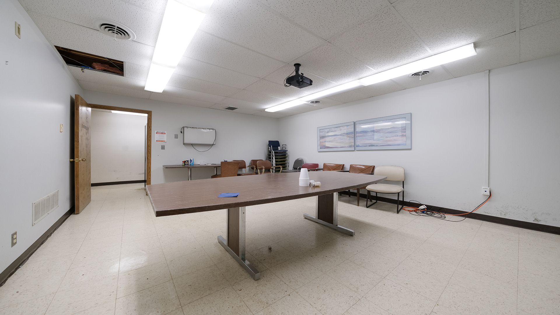 405 Charles Street Mount Morris, IL 61054 - Photo 49 of 61 a living room with table chairs and a wooden floor