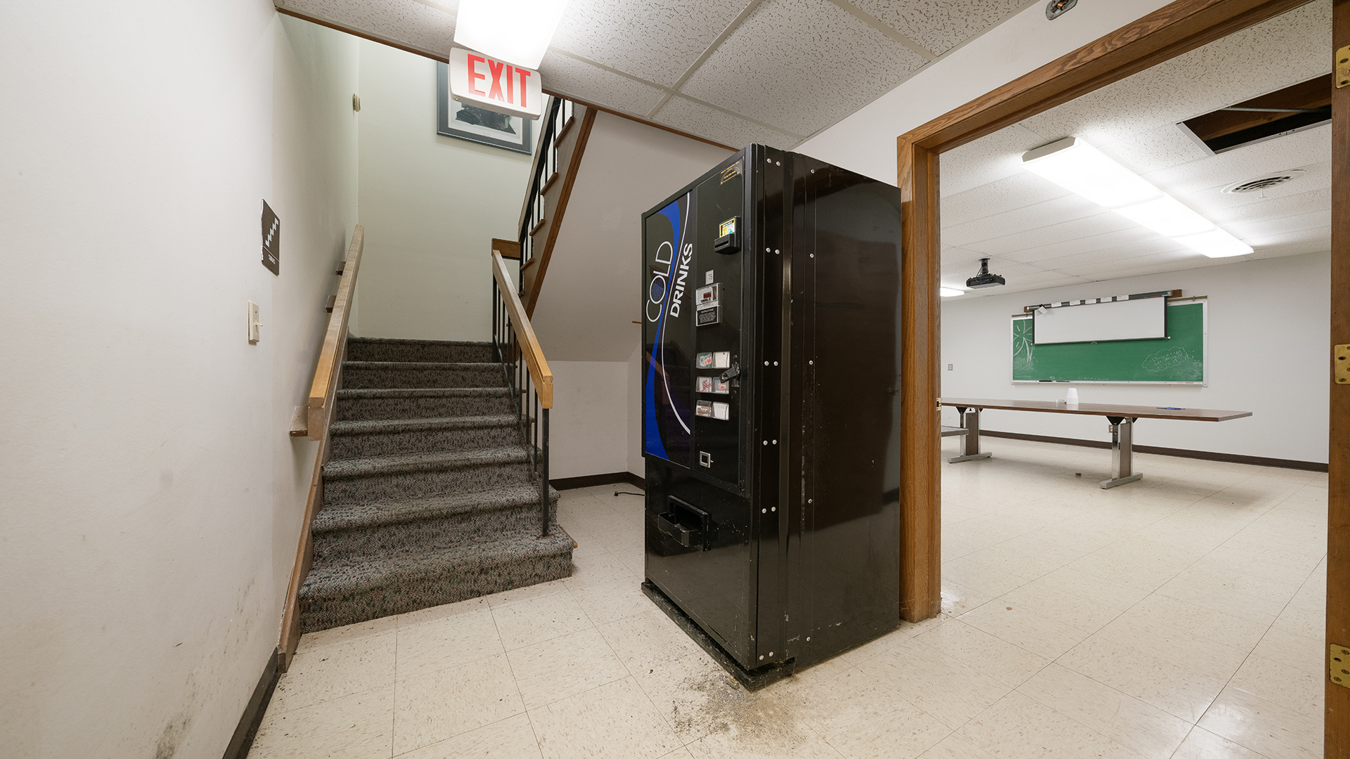 405 Charles Street Mount Morris, IL 61054 - Photo 50 of 61 a view of a hallway with a cabinet and mirrors