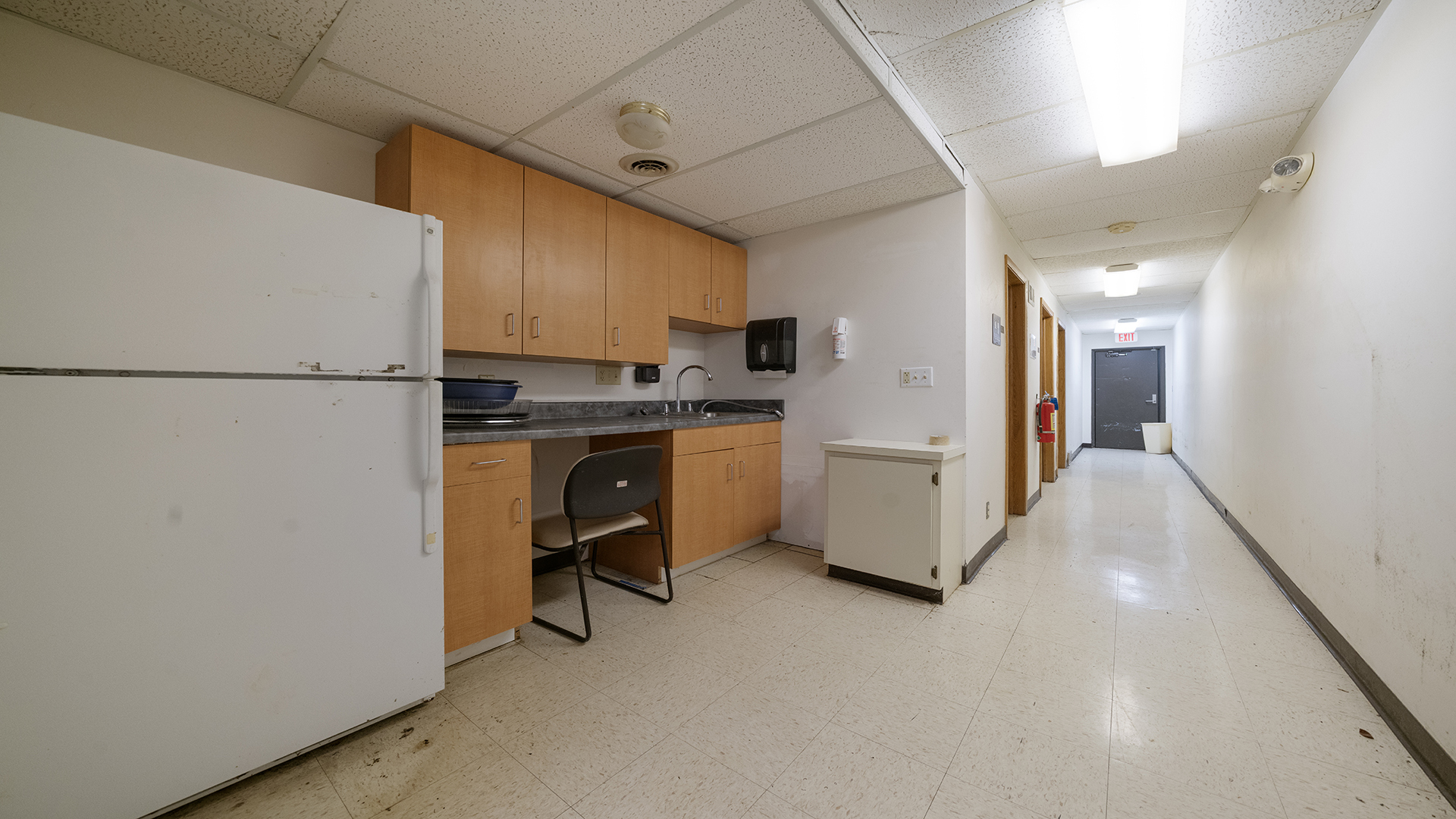 405 Charles Street Mount Morris, IL 61054 - Photo 51 of 61 a view of a kitchen with a sink refrigerator and cabinets
