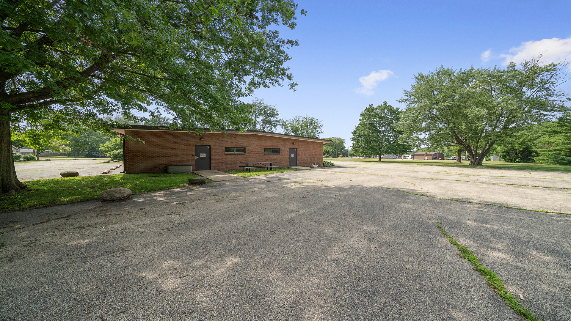 405 Charles Street Mount Morris, IL 61054 - Photo 56 of 61 a view of a house with a yard and large tree