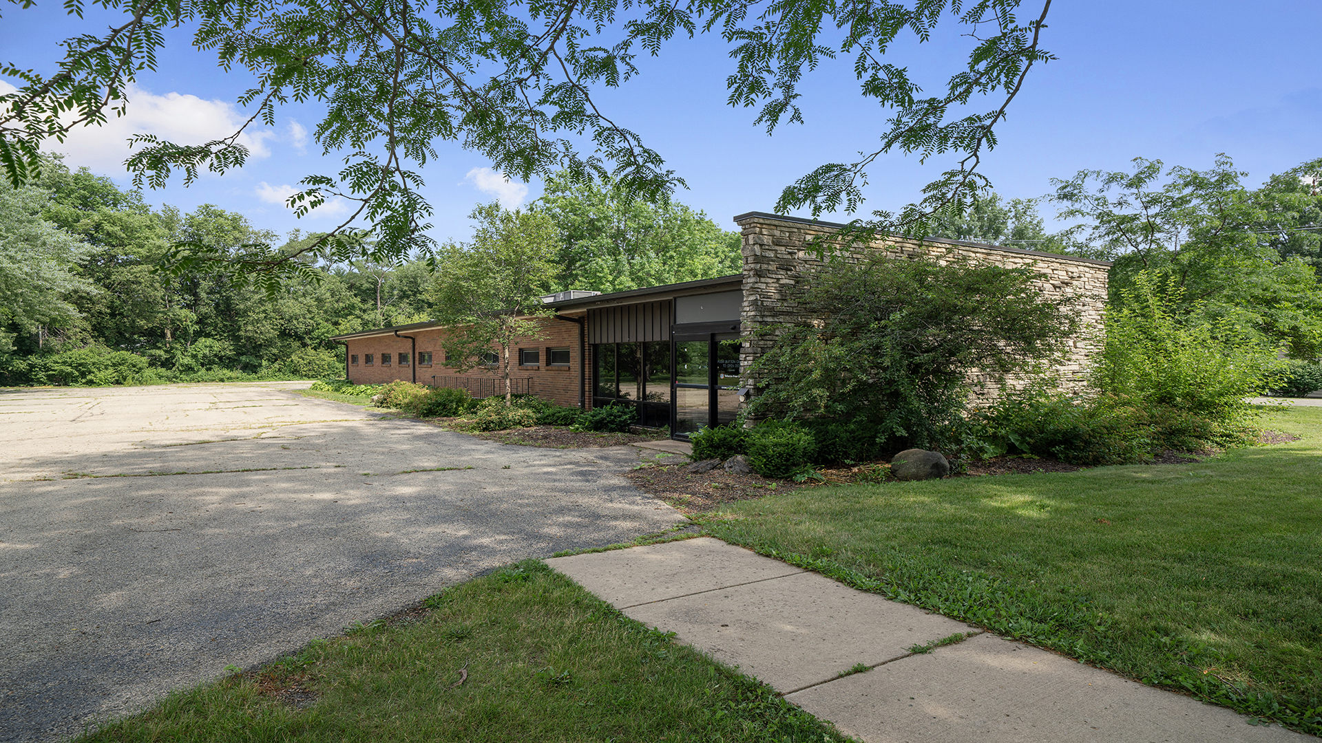 405 Charles Street Mount Morris, IL 61054 - Photo 59 of 61 a front view of a house with a yard and a tree