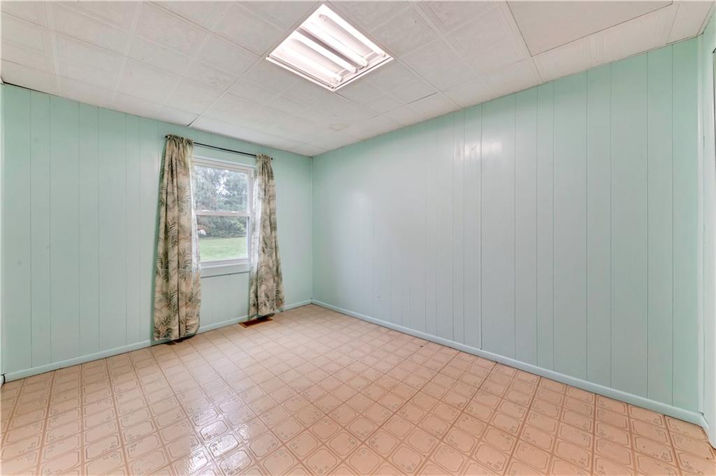1299 Harvey Run Road Freedom, PA 15042 - Photo 17 of 25 an empty room with windows