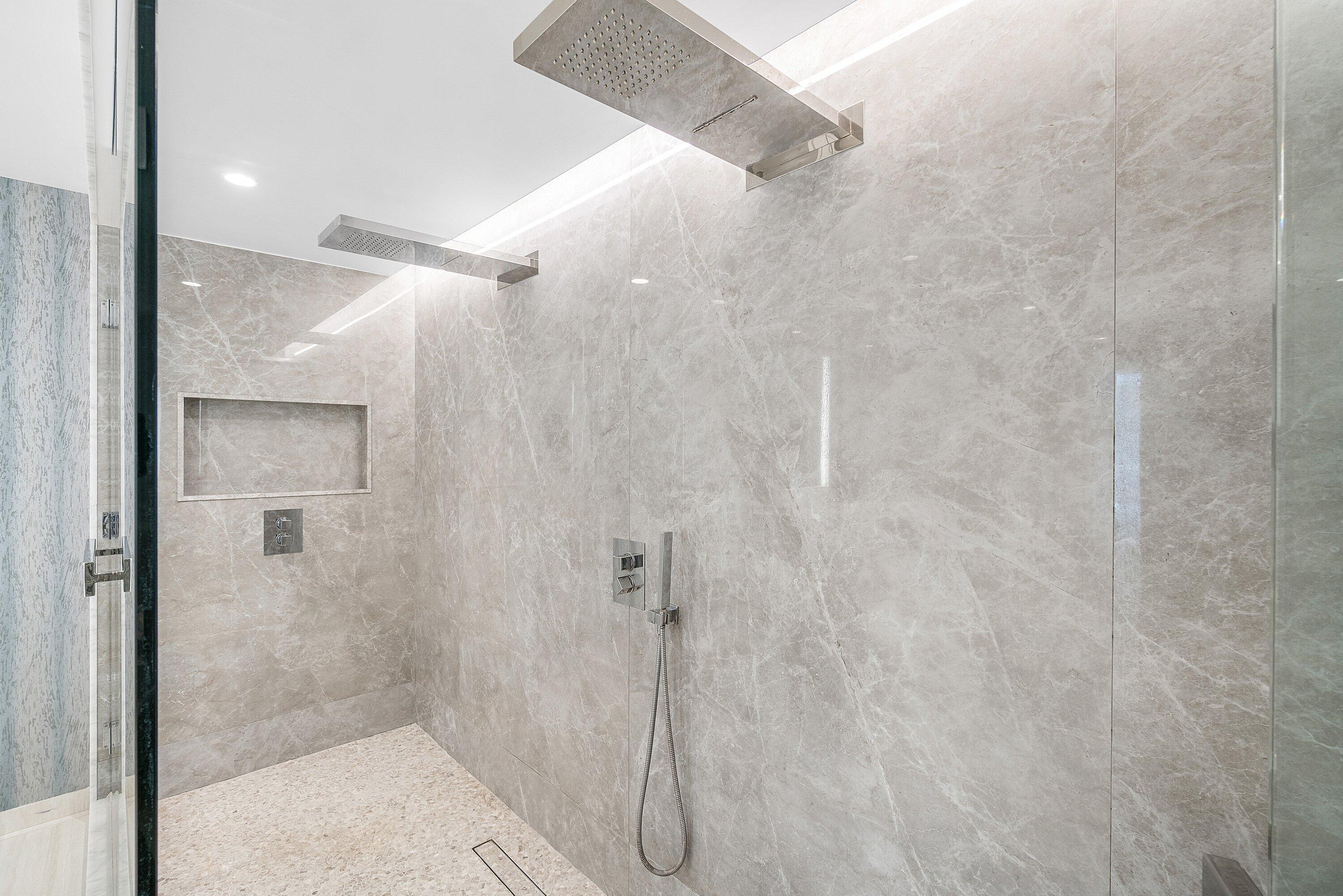 200 Southeast Mizner Boulevard, Unit 209 Boca Raton, FL 33432 - Photo 13 of 60 a bathroom with a shower