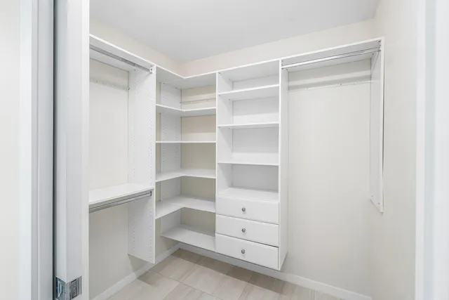 a view of an empty walk in closet