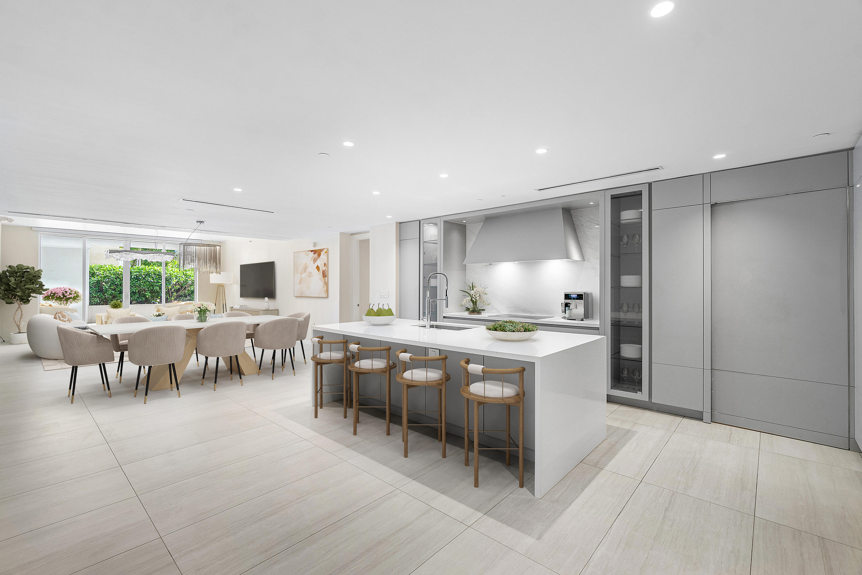 200 Southeast Mizner Boulevard, Unit 209 Boca Raton, FL 33432 - Photo 2 of 60 a kitchen with lots of counter top space and dining table