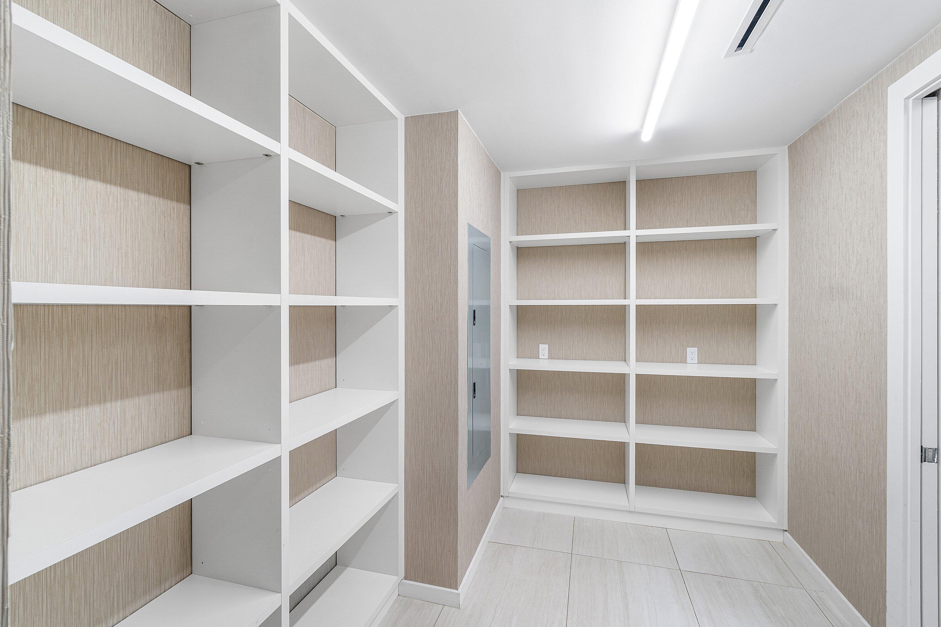 200 Southeast Mizner Boulevard, Unit 209 Boca Raton, FL 33432 - Photo 28 of 60 a view of an empty walk in closet