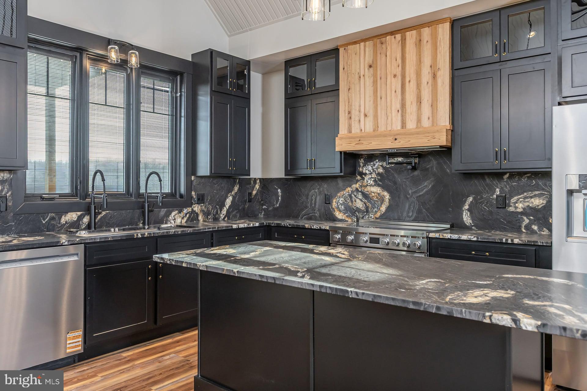 75 Ferrell Road Mullica Hill, NJ 08062 - Photo 11 of 42 a kitchen with sink a stove and cabinets