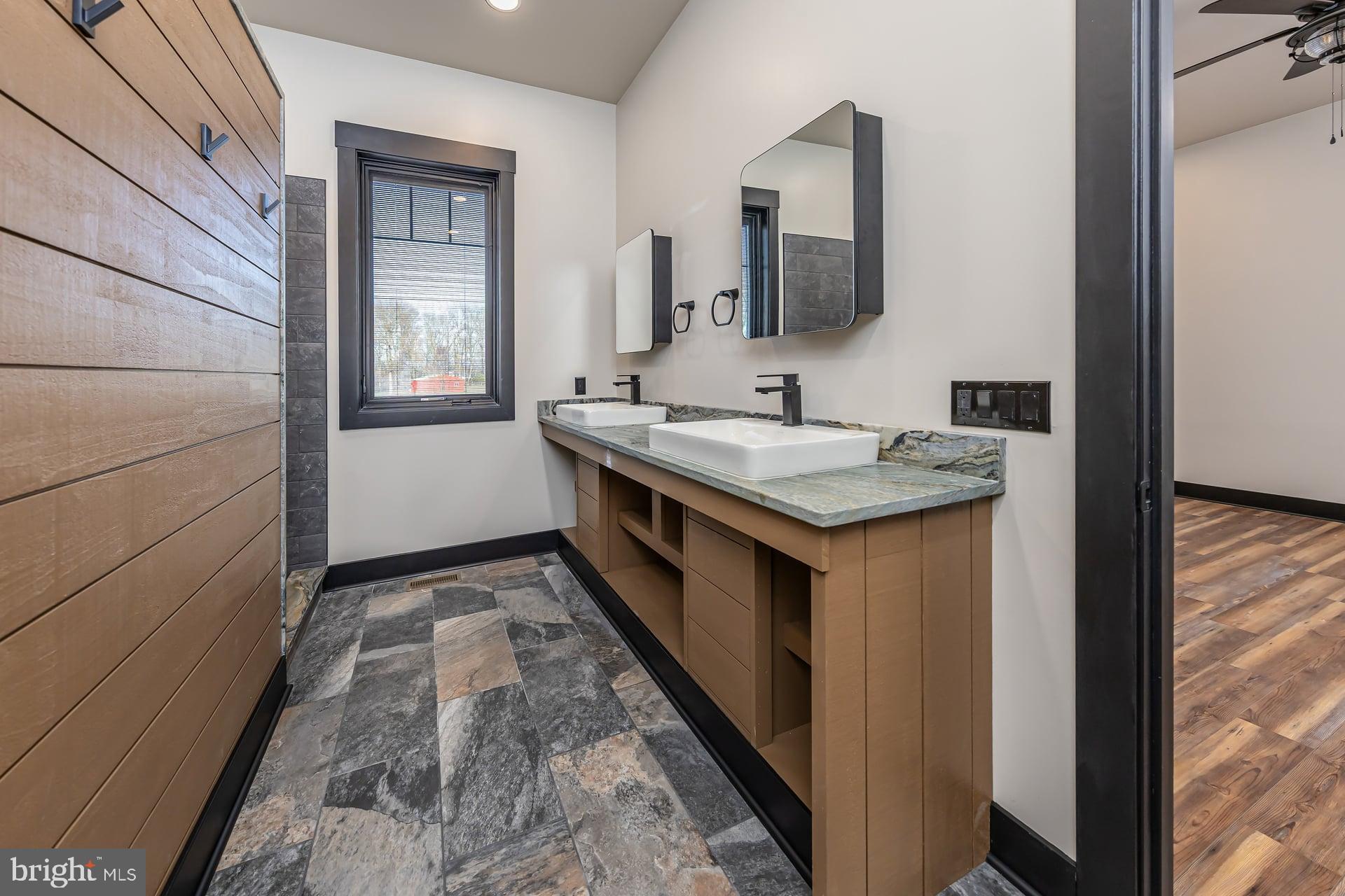 75 Ferrell Road Mullica Hill, NJ 08062 - Photo 22 of 42 a en suite bathroom with a sink and a mirror