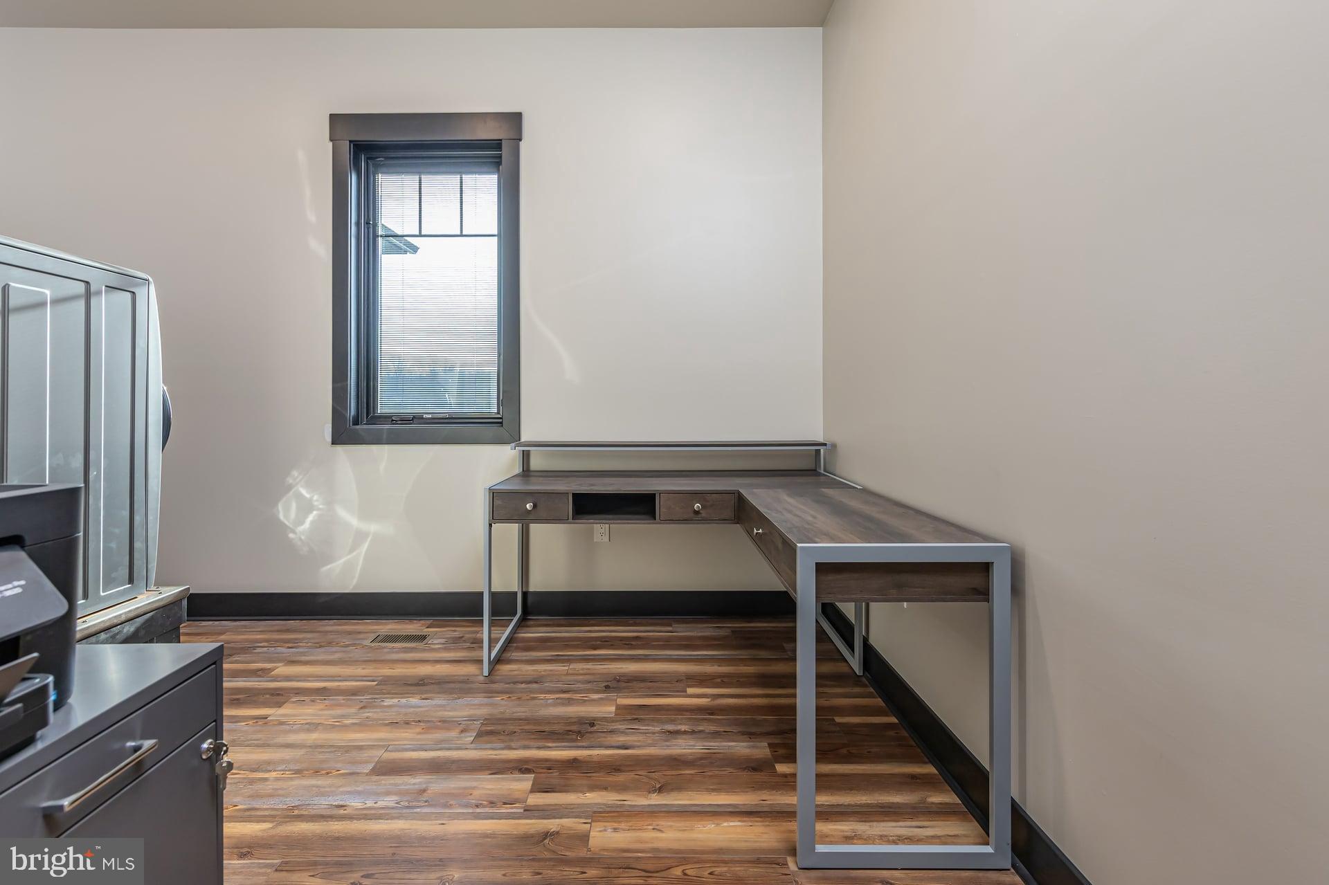 75 Ferrell Road Mullica Hill, NJ 08062 - Photo 29 of 42 a view of a livingroom with wooden floor and a staircase