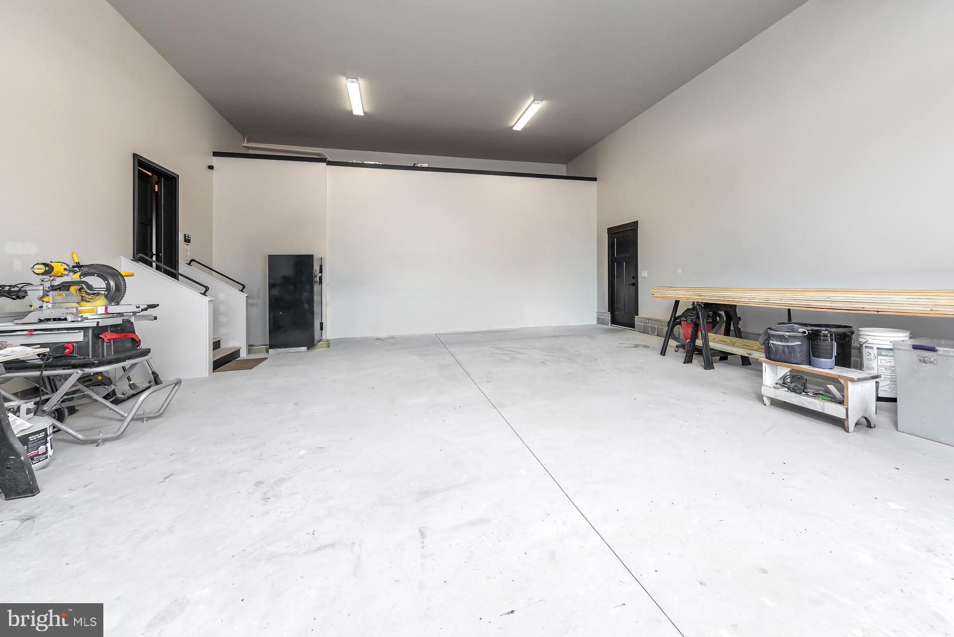 75 Ferrell Road Mullica Hill, NJ 08062 - Photo 31 of 42 a view of a livingroom with furniture and a garage