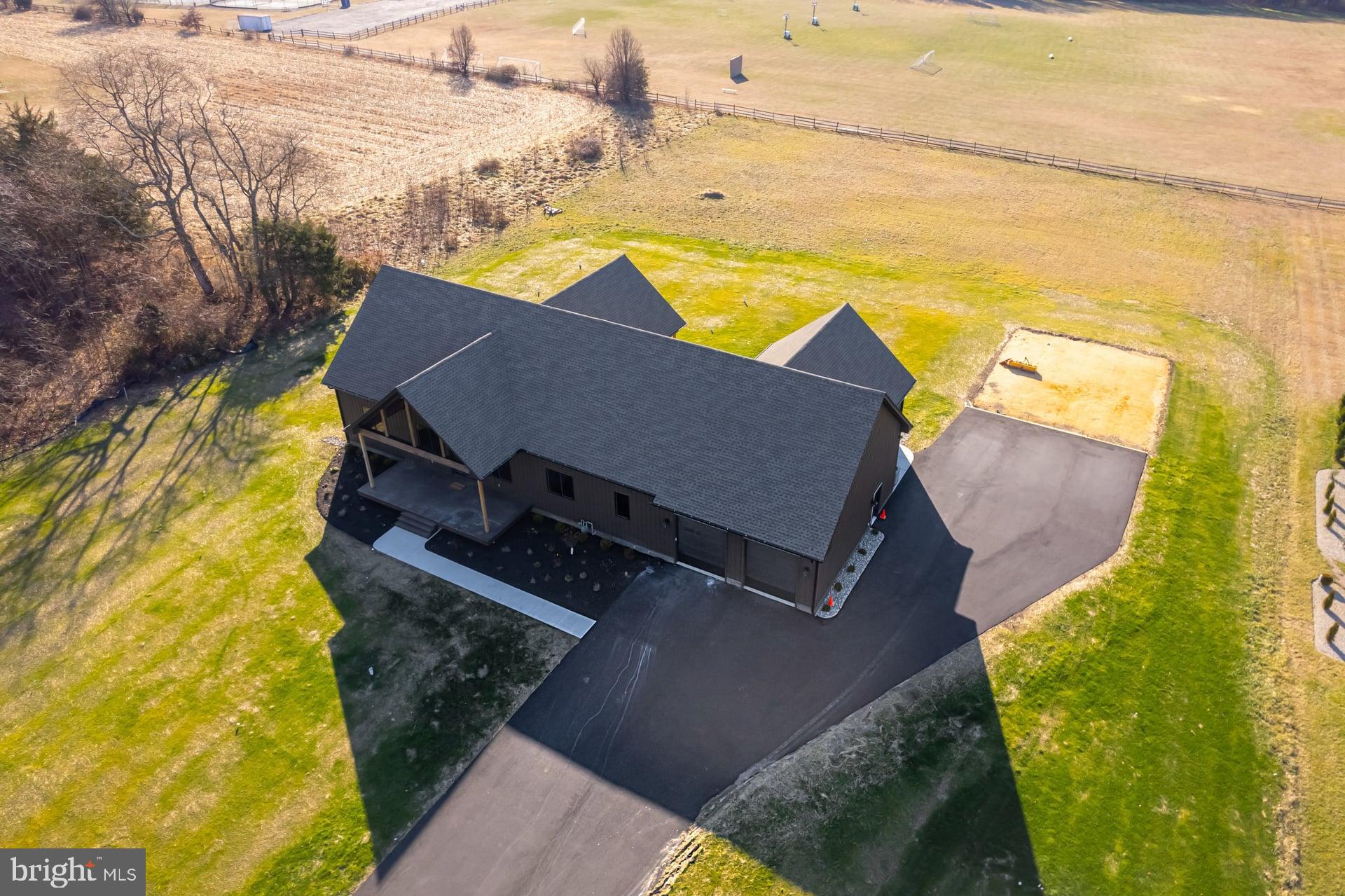 75 Ferrell Road Mullica Hill, NJ 08062 - Photo 40 of 42 a aerial view of a house with swimming pool